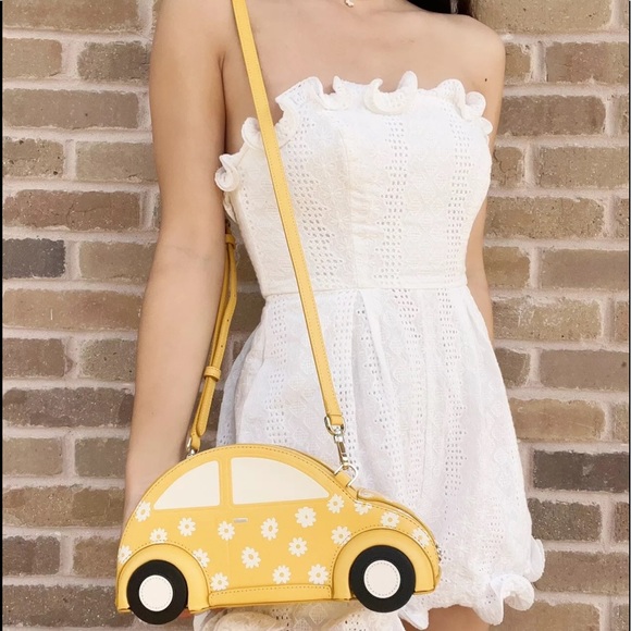 kate spade Handbags - Kate Spade Beep Beep Car Crossbody Bag Yellow Multi Novelty Leather Daisy